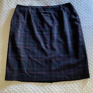 Talbots dark blue plaid skirt with kick-pleat detail and raspberry accent